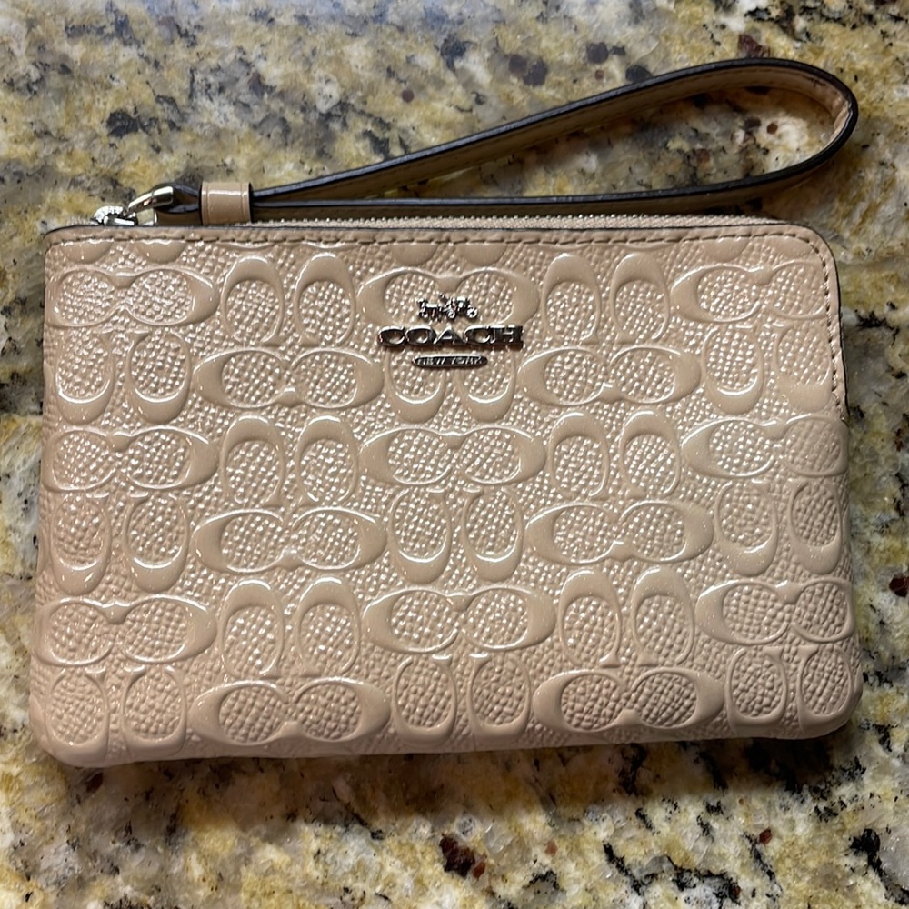 Wristlet soft pink coach